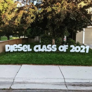 lots of white thin plastic letters that spell diesel class of 2021