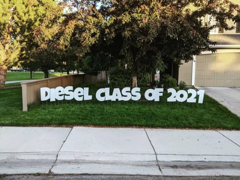 lots of white thin plastic letters that spell diesel class of 2021