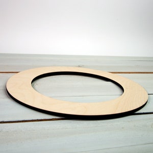 unfinished wooden ring shape for making a wreath, circle frame, or other craft projects
