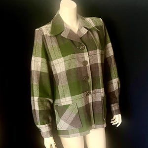 May include: A set of three ceramic mugs with a speckled, matte finish. The mugs are in shades of cream, light gray, and dark gray. Each mug has a simple, minimalist design, perfect for coffee or tea.