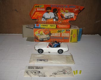 Corgi 336 James Bond Solo se vive dos veces Set de los años 60 totalmente funcional, baúl, falta insignia.