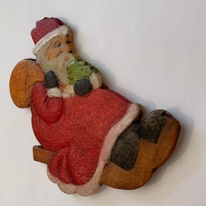 Santa On A Sled