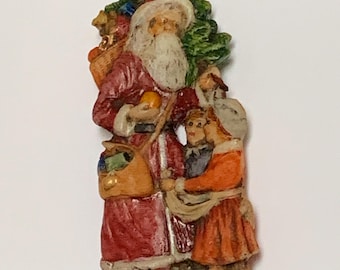 Saint Nicholas with children and toys.