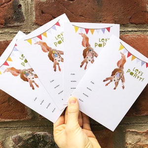 May include: Four white invitation cards featuring a squirrel illustration and the text "Let's Pop" and "Let's Party!" printed on them.