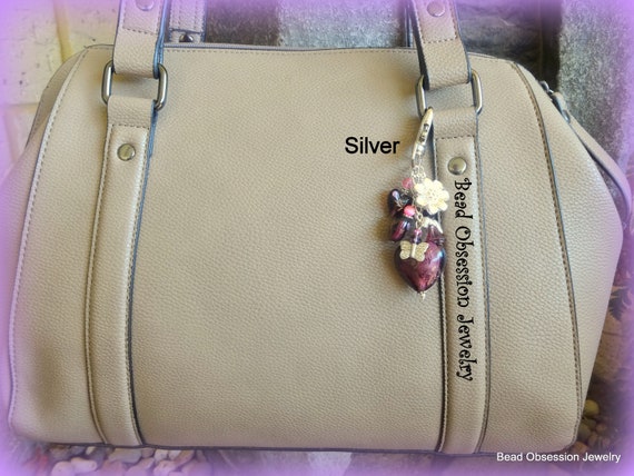 Buy CAPRESE Plum Button Treza Faux Leather Women's Casual Wear Tote Handbag  | Shoppers Stop