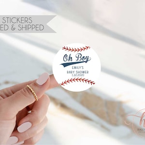 May include: 2 inch round baseball themed sticker with red stitching and the text "Oh Boy" in blue with the words "Emily's Baby Shower 1.22.2020" underneath.