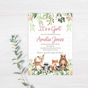 May include: It's a Girl! Baby shower invitation with a watercolor illustration of woodland animals, including a deer, fox, raccoon, and bear. The invitation includes the text "It's a Girl!" and "Amelia Jones".