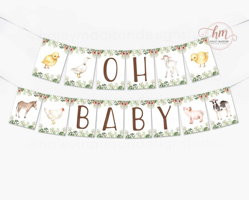May include: A white banner with green foliage and pink flowers reads "Oh Baby" in brown letters. Each letter is on a separate flag. The flags are decorated with farm animals, including a donkey, a chicken, a goose, a goat, a pig, and a cow.