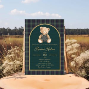 May include: Baby shower invitation featuring a watercolor teddy bear in overalls. The invitation has a green and navy plaid border and includes the text "Join us for a baby shower honoring Maureen Hudson". The date is September 20, 2020.