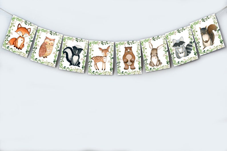 May include: A woodland animal themed banner with a fox, owl, skunk, deer, bear, rabbit, raccoon, and squirrel. Each animal is illustrated in a watercolor style with green foliage surrounding them.