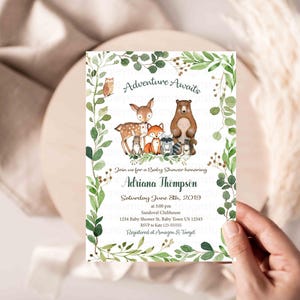 May include: A baby shower invitation with a woodland theme. The invitation features a watercolor illustration of a deer, bear, fox, owl, and raccoon surrounded by green leaves. The text on the invitation reads "Adventure Awaits" and includes the name "Adriana Thompson", the date "Saturday June 8th, 2019", and the time "at 3:00 pm".