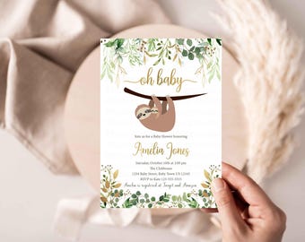 May include: A baby shower invitation featuring a sloth hanging from a branch. The invitation is decorated with green leaves and gold lettering. The text on the invitation reads "Oh Baby" and includes the name "Amelia Jones" and details for the shower.