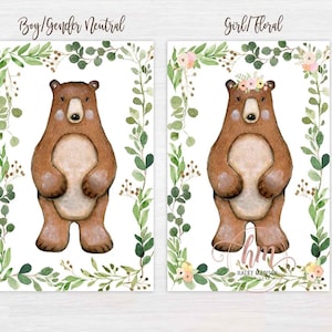 May include: Two watercolor illustrations of a brown bear with green foliage surrounding the bear. The bear on the left has no accessories. The bear on the right has a floral crown. The text "Boy/Gender Neutral" is above the left bear and the text "Girl/Floral" is above the right bear.