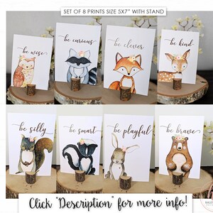 Puede incluir: Conjunto de ocho impresiones de 12,7 x 17,8 cm con animales del bosque y mensajes inspiradores. Cada impresi&oacute;n tiene un animal y un mensaje diferente, como "s&eacute; sabio", "s&eacute; curioso", "s&eacute; amable", "s&eacute; inteligente", "s&eacute; tonto", "s&eacute; inteligente", "s&eacute; juguet&oacute;n" y "s&eacute; valiente". Las impresiones est&aacute;n sobre un fondo blanco con un soporte de madera marr&oacute;n.