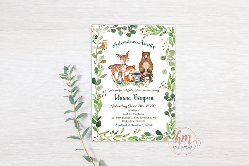 May include: A green and gold baby shower invitation with a woodland theme. The invitation features a deer, bear, fox, raccoon, and owl surrounded by greenery. The text reads "Adventure Awaits" and includes the name "Adriana Thompson", the date "Saturday June 8th, 2019", the time "at 3:00 pm", the location "Sandoval Clubhouse", the address "1234 Baby Shower St. Baby Town US 12345", the RSVP information "RSVP to Ka 123-355", and the registry information "Registered at Amazon & Target".