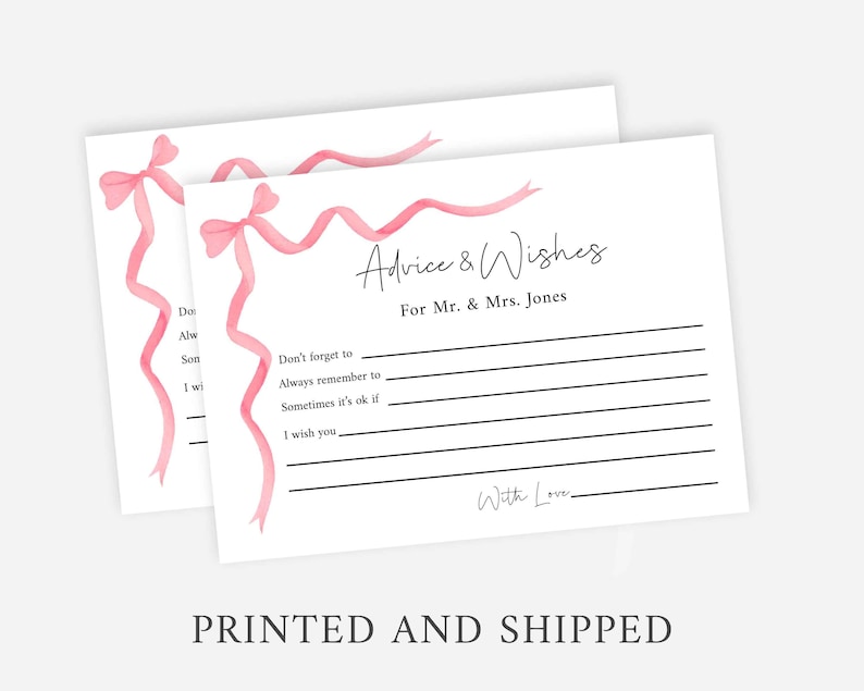 May include: Two white cards with pink ribbon designs and black lines. The text on the card reads "Advice & Wishes" for Mr. & Mrs. Jones. The card has lines for writing advice and wishes. The text "With Love" is at the bottom of the card.