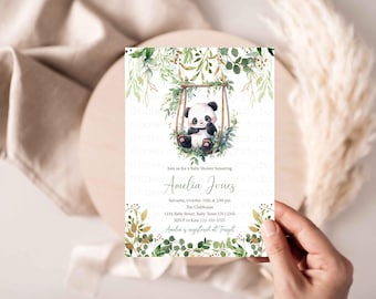 May include: A baby shower invitation with a watercolor illustration of a panda bear sitting on a swing surrounded by green leaves. The invitation is for Amelia Jones and includes the date, time, location, and RSVP information. Amelia is registered at Target.