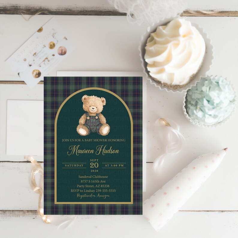 May include: Baby shower invitation featuring a teddy bear illustration on a dark green plaid background. The invitation includes the text "Join us for a baby shower honoring Maureen Hudson" and event details.