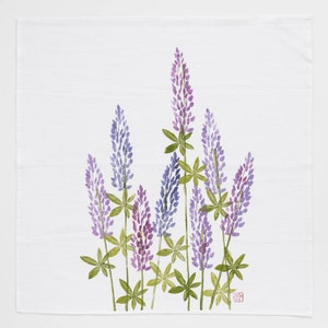 May include: A watercolor painting of a bouquet of purple and blue lupine flowers with green leaves on a white background.
