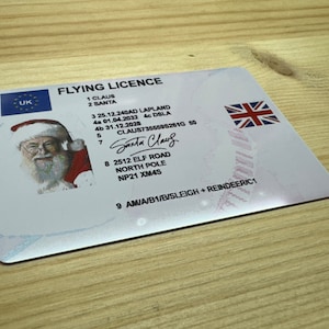 Santa's Lost Flying License - rijbewijs plastic kaart kerstman - leuk - dubbelzijdig