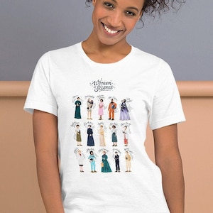 May include: A white t-shirt with a graphic of 20 women in science. The graphic includes the text "Women in Science".