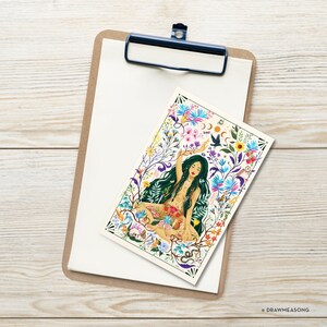 May include: A colorful illustration of a woman sitting in a lotus position surrounded by flowers, plants, and animals. The woman has long dark hair and is wearing a necklace. The background is a cream color.