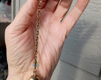Amuleto de campana espiritual para bendiciones y protección