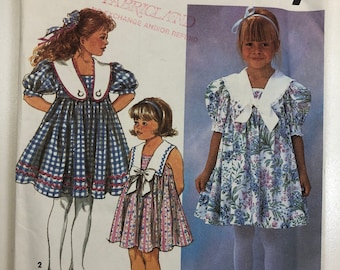 Simplicity 7697 Uncut Sewing Pattern  1990s Vintage Little Girl's Pullover Dress Yoked Front Button On Contrast Collar Flared Size 2 3 4