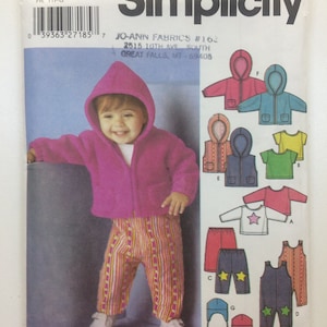 Pode incluir: Padrão de costura Simplicity #5316 para roupas infantis. O padrão inclui instruções para fazer uma jaqueta com capuz, um colete, calças, um macacão e um chapéu. O padrão foi projetado por Karen Z.