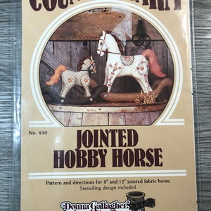 May include: A craft pattern for making a jointed hobby horse. The pattern includes instructions for making an 8-inch and a 12-inch horse. The pattern is called "Country Charm" and is by Donna Gallagher Creative Needlearts.