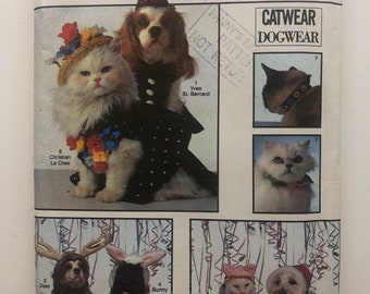 May include: A Simplicity Crafts sewing pattern for making cat and dog costumes. The pattern includes designs for a variety of costumes, including a witch, a deer, a bunny, a Santa, and a Christian La Claw. The pattern is for sizes A, and all sizes are included. The pattern number is 8936.