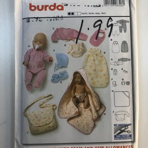 May include: Burda sewing pattern number 8306 for doll clothes. The pattern includes instructions for making a pink sweater, a white dress, a blue hat, a nappy, a sleeping bag, a baby carrier, and a blanket. The pattern is for dolls 12 to 14 inches or 30 to 35 centimetres.