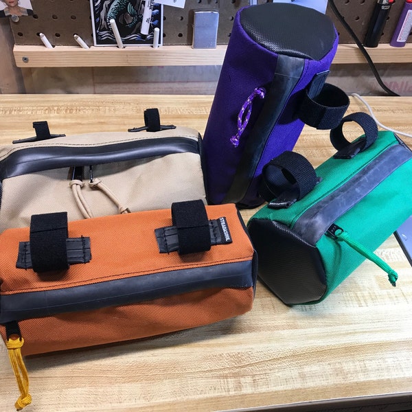 The "TallBoy" bicycle handlebar/underseat bag made from repurposed materials