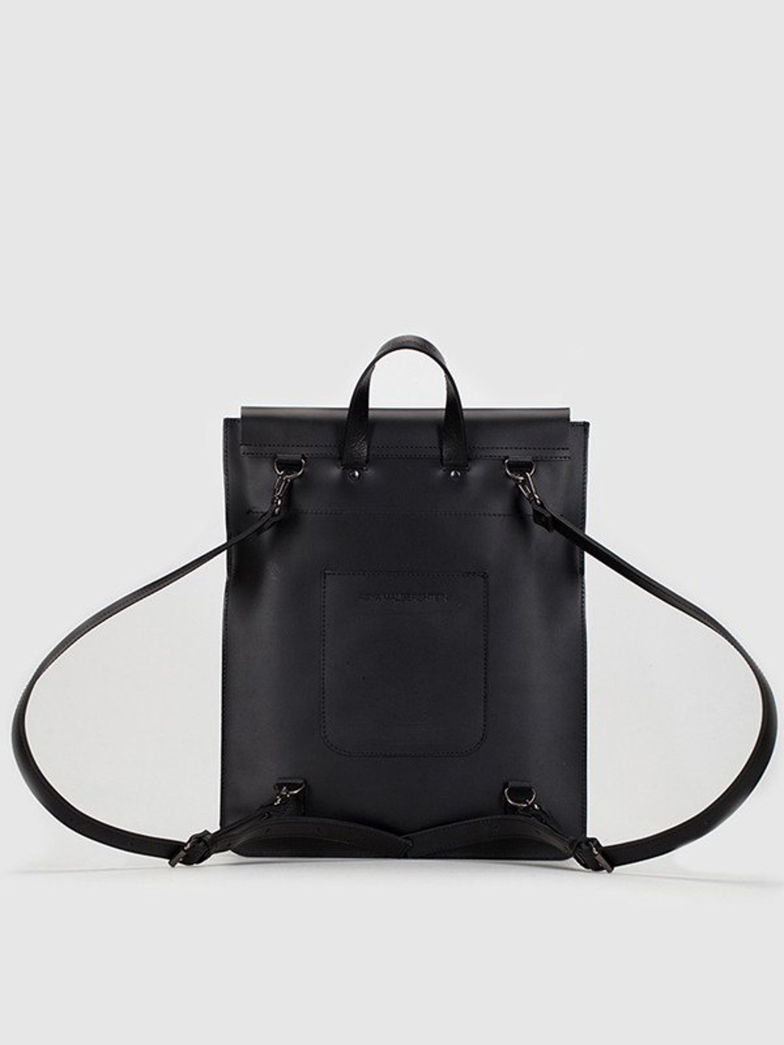 Black leather rectangular backpackbag with detachable straps. Etsy