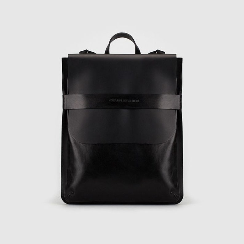 Black leather rectangular backpackbag with detachable straps. Etsy