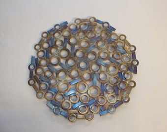 Stainless steel serving trivet "Spin out" - Heat treated