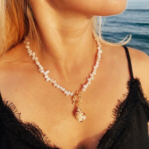 Fresh Water Pearls Necklace With Shell Pendant