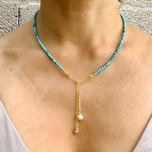 Turquoise, pearl and gold plated silver necklace with shell pendant