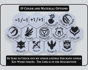 May include: A collection of hexagonal game tokens featuring black icons and text on a light background. The tokens display symbols for -1/-1, +1/+1, Deathtouch, Double Strike, First Strike, Flying, Hexproof, Indestructible, Lifelink, Menace, Reach, Trample, and Vigilance.