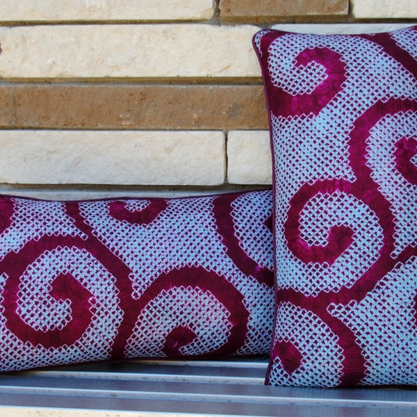 Hand crafted home decor pillow created with Japanese shibori silk in colors of magenta and blue