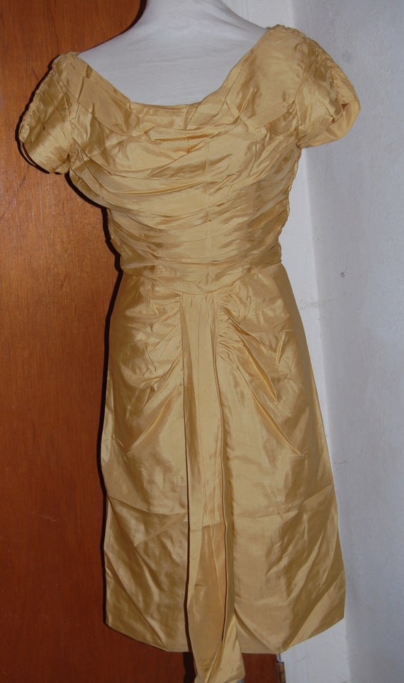 Neusteters yellow wiggle dress. 1950's-60's