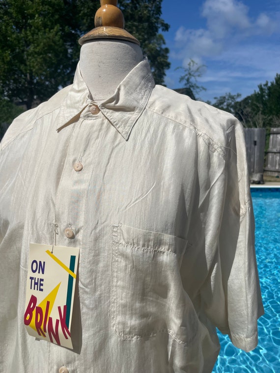 Beautiful 1980s ivory silk blouse