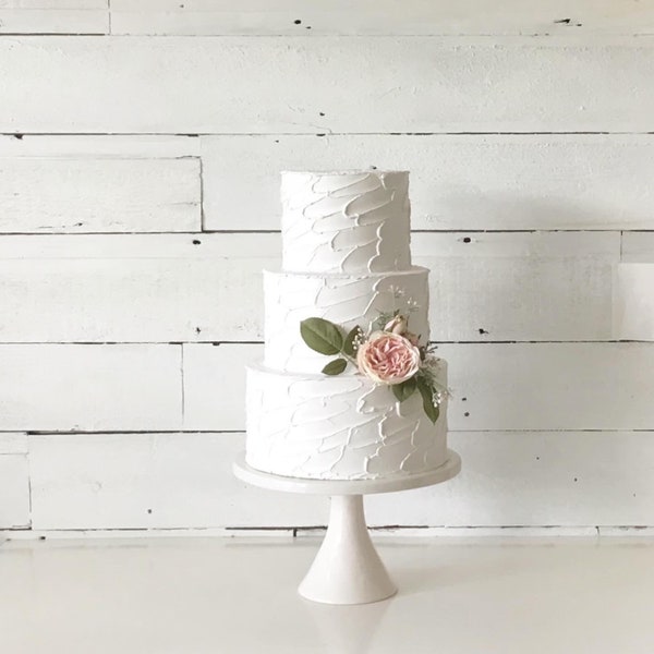 Fake wedding cake.  tall tiers cake.  Display cakes. centerpiece