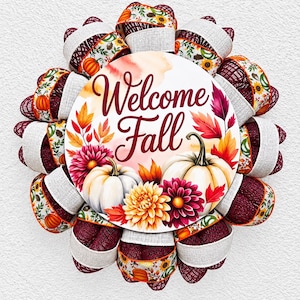 May include: A circular wreath featuring a central sign with the text Welcome Fall, decorated with illustrations of white pumpkins, orange and burgundy dahlias, and autumn leaves. The wreath is constructed from burgundy and beige mesh ribbons.