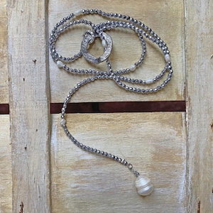 Very long hematite and river pearls necklace