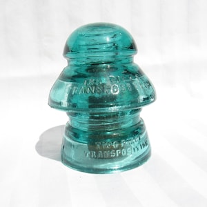 Two Part Insulator, 2 Part Aqua Am Tel & Tel insulator with wood pin - collectible, pretty glass