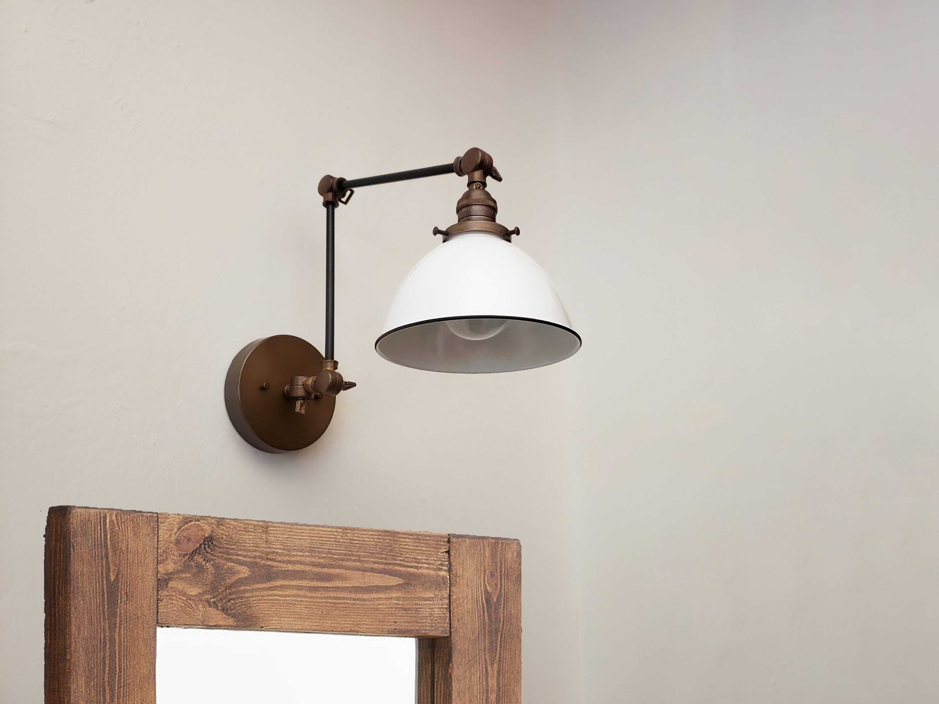 Swing arm vanity light deals