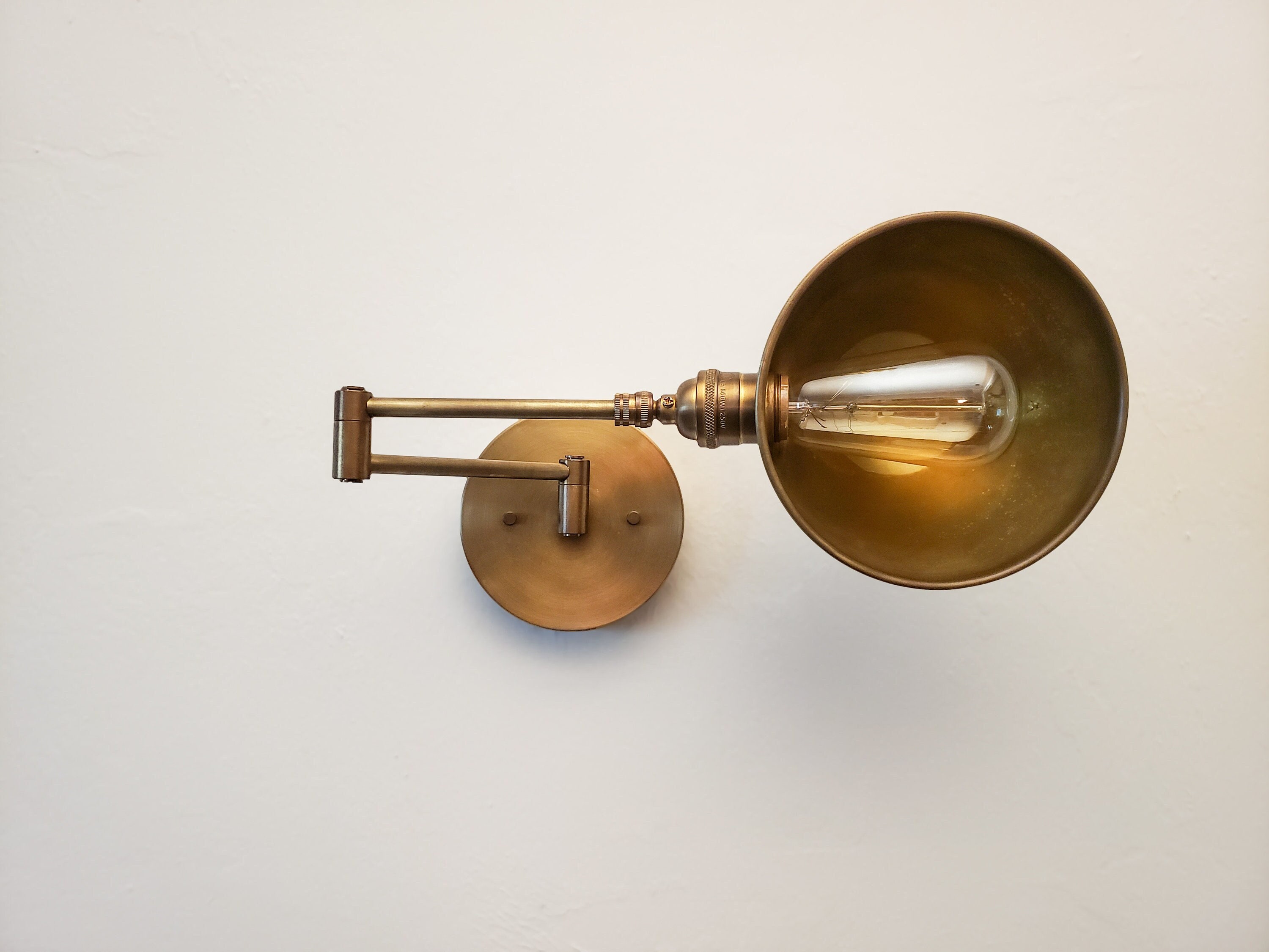 Antique brass swing arm wall lamp outlet