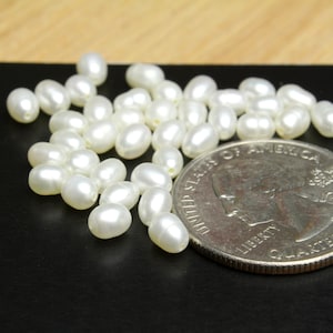 Witte zoetwater rijstparels ca. 4x5mm 10pcs