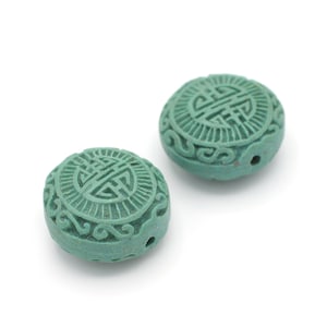 Carved Round Wood Beads with Carved Designs in a Turquoise Color 10x16mm 2pcs